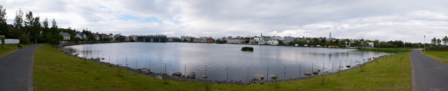 Lake Tjornin And Downtown Reykjavik
