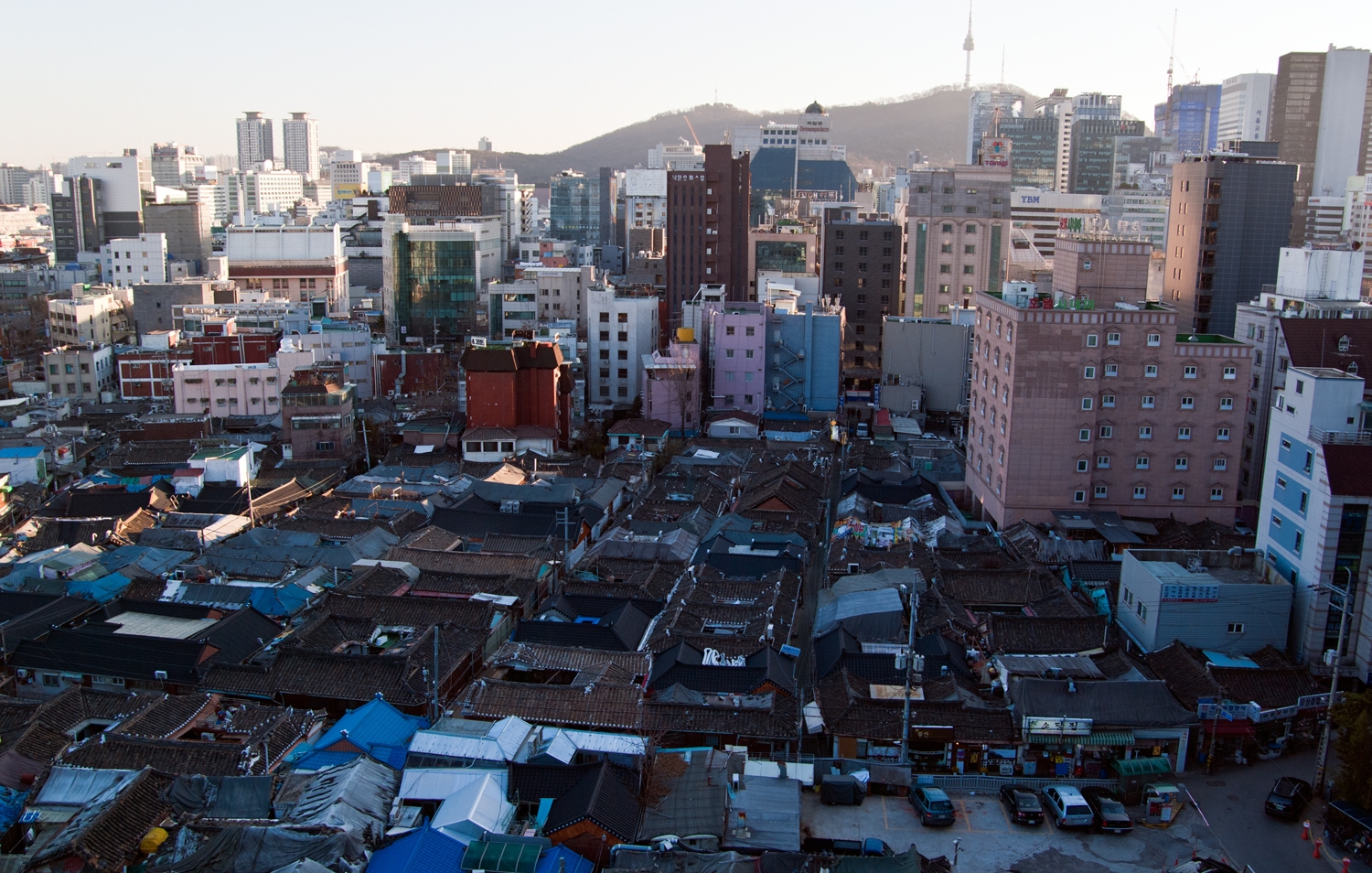 South Korean Hanok, Shadowed By The City