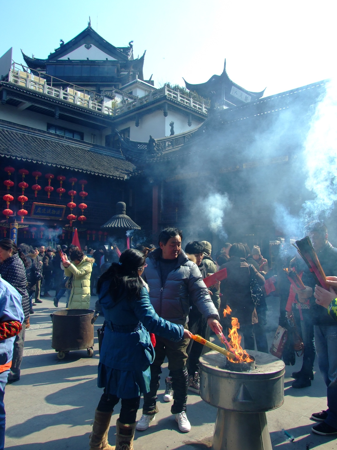 Burning Incense At The Temple