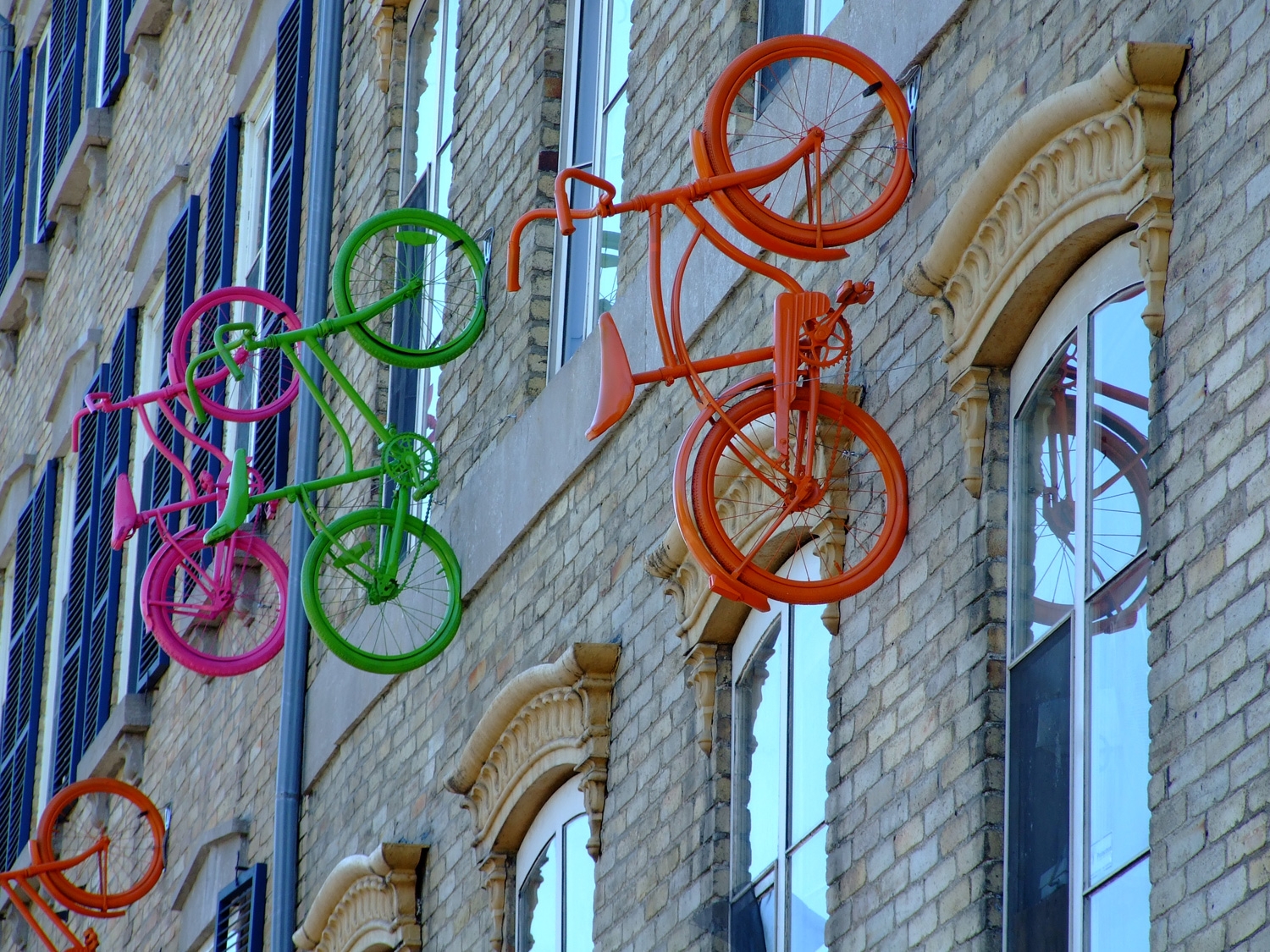 Colorful Bikes Riding The Walls
